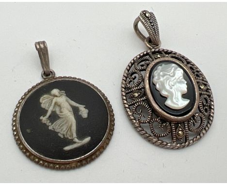 2 vintage silver pendants. A black Jasperware circular shaped pendant, by Wedgwood, together with an oval pierced work pendan
