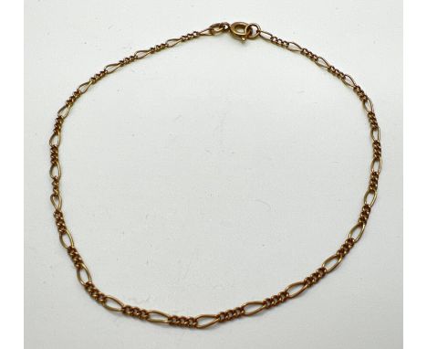 A 9ct gold 8" fine figaro chain bracelet with spring ring clasp. Total weight approx. 1.1g. 