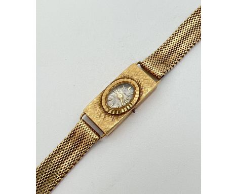 A vintage 18 ct gold ladies wristwatch by Cortebert. Gold case and mesh strap with hallmarks to inside of case, back of strap