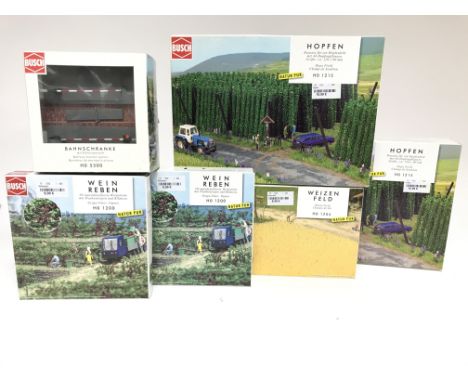 A collection of Busch Railway model theming kits all boxed.(6)