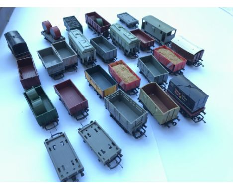 A collection of model railway rolling stock.
