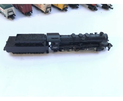 A Fleischmann n gauge locomotive, plus carriages