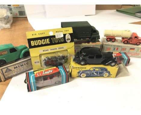 A collection of various die cast cars including a Minic Morris light van, a Citroen c.v. And others (7)