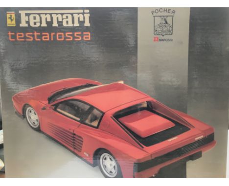 A Ferrari Testarossa 1/8 scale model kit boxed and unbuilt.