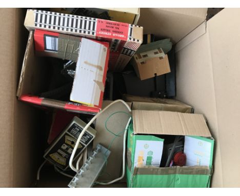 A box containing Model railway track, rolling stock ect.