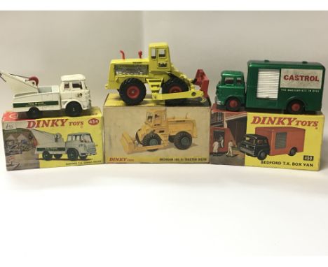 Three boxed Corgi Toys including Bedford T.K. Crash Truck no. 434, Michigan 180-III Tractor Dozer no. 976, and a Bedford T.K.