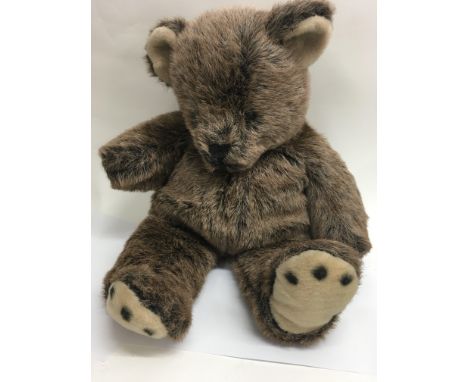 A light brown bear 44 cm .