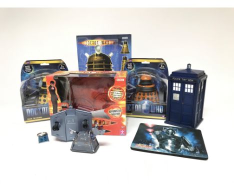 A box containing Doctor who toys including Daleks, k-9, tardis.