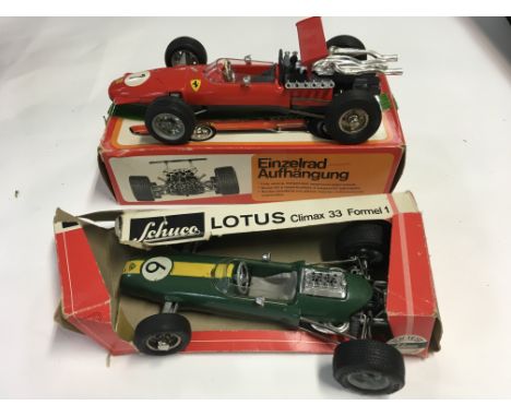 A Schuco Ferrari Formula 2, model 1073 with original box plus a Schuco Lotus 33 formula 1 model 1071.