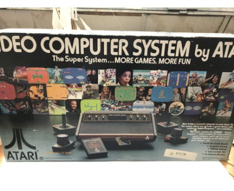An Atari video games system boxed. Model number Cx-2600