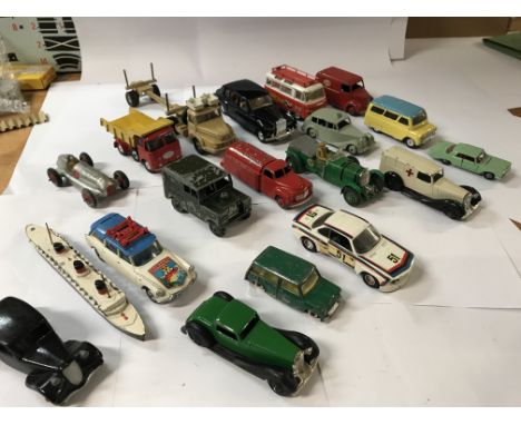 A collection of 20 playworn vehicles including Dinky, corgi.