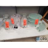 Lot of glass drink dispensers and serving station