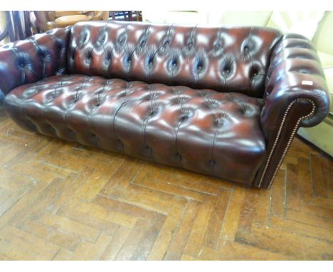 Oxblood leather buttoned Chesterfield sofa