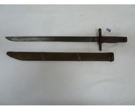 WWII Japanese Bayonet stamped with marks for Toyada Jido Shokki Seisakusho, in wooded scabbard 