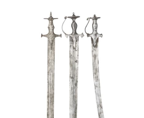 THREE INDIAN SWORDS (TALWAR), 19TH CENTURY the first with broad fullered double-edged blade, silver-plated hilt including lar