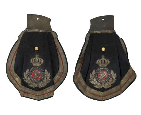 A PAIR OF VICTORIAN EQUERRY'S PISTOL HOLSTERS Two leather holsters, each with pleated blue cloth covers of the pattern worn b
