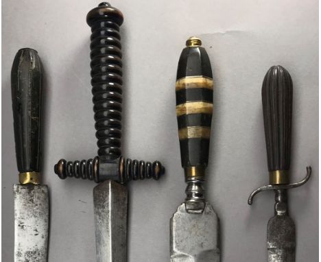 FOUR MEDITERRANEAN DAGGERS, LATE 18TH/19TH CENTURY the first with tapering double-edged blade, and swelling faceted grip comp