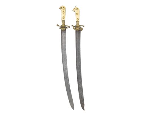 ˜TWO AUSTRIAN HUNTING SWORDS, CIRCA 1780 with curved blades double-edged towards a clipped-back point, etched on each side wi