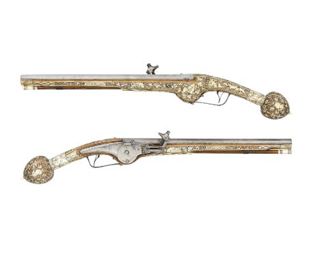 ˜A PAIR OF 24 BORE GERMAN WHEEL-LOCK HOLSTER PISTOLS, THIRD QUARTER OF THE 17TH CENTURY WITH 19TH CENTURY DECORATION each wit