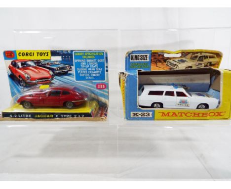 Corgi Toys - a 4.2 Litre Jaguar 'E' Type 2+2, red body # 335, model mint in original blister pack box, some wear to edge of b