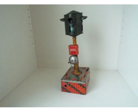 A vintage tin plate clockwork and battery operated Signal marked 'Safety First' with coloured red and green filters with inte