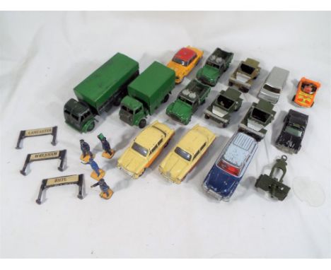 Dinky Toys - a small collection to include Dinky Army Wagon # 623, two Army 1 ton cargo trucks, 10 ton Army truck, three Scou