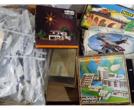 A good mixed lot to include model kits, parts,to include Faller, Marklin and other