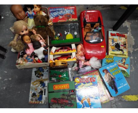 A mixed lot of children's toys to include a pram full of vintage dolls and teddies, a Snoopy mirror, a Screwball Scramble gam