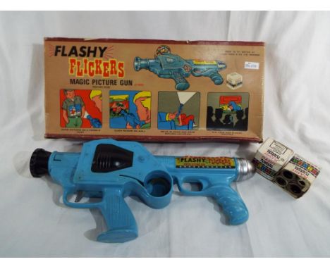 A Flashy Flickers magic picture gun by Marx, boxed