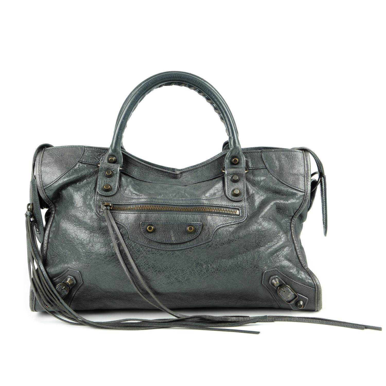 BALENCIAGA - a grey Classic City handbag. Crafted from glazed grey