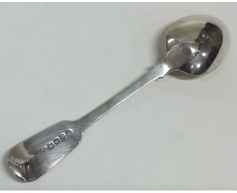 PAUL STORR: A fiddle pattern silver dessert spoon with crested terminal. Approx. 48 grams. Est. £80 - £120.