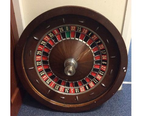 A large mahogany and slate bagatelle game. Est. £50 - £80.
