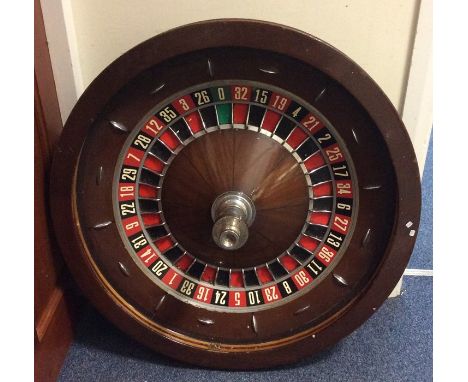 A large mahogany and slate bagatelle game. Est. £50 - £80.