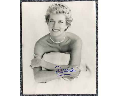 PRINCESS DIANA: A framed and glazed portrait photograph, signed 'Diana', together with a certificate of authenticity from Sta