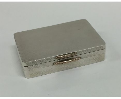A fine quality silver gilt and gold mounted travelling compact with three compartments. London. By PG. Approx. 175 grams. Est