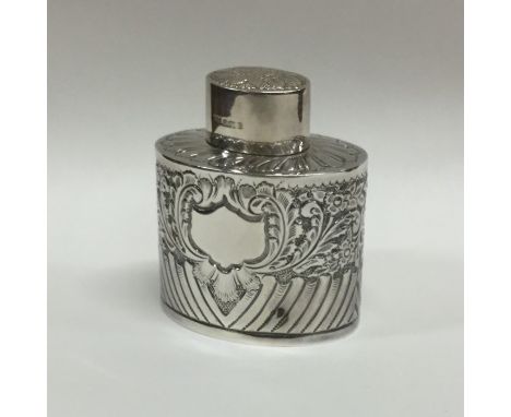 An Edwardian half fluted silver tea caddy. Sheffield. By HA. Approx. 79 grams. Est. £30 - £40.