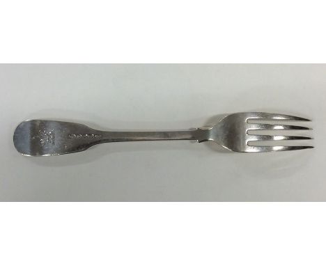 PAUL STORR: A fiddle pattern silver table fork with crested terminal. Approx. 79 grams. Est. £80 - £120.