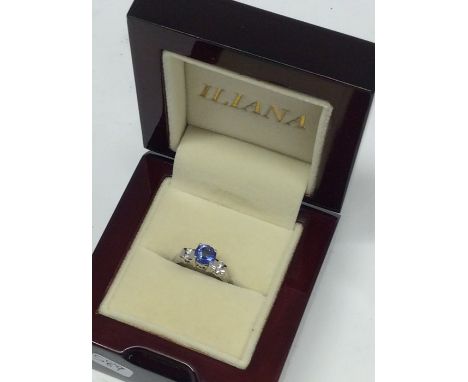 A sapphire and diamond mounted five stone ring in white gold mount. Approx. 3.4 grams. Est. £30 - £50.