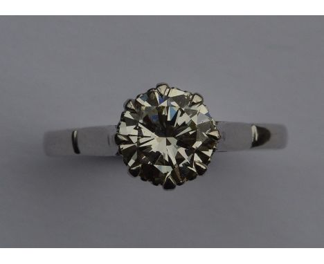 A good diamond single stone mounted as a ring in eight claw platinum setting. Approx. 2 carats. Approx. 5 grams. Est. £6500 -