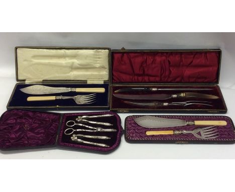 Three sets of cased fish eaters together with a nutcracker set. Est. £20 - £30.