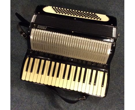 A cased 'Frisco' accordion in case. Est. £40 - £60.