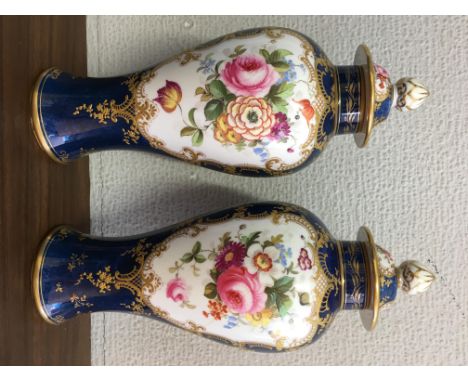 PAIR OF STAFFORDSHIRE BALUSTER BOTANICAL SPRAY VASES AND COVERS PAINTED BY E COCKER A/F