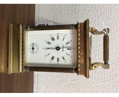 A BRASS CARRIAGE CLOCK, MARKED ANGELUS