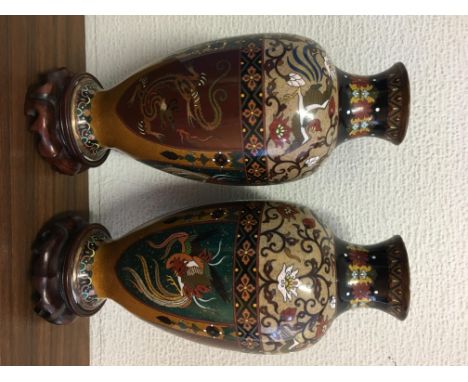 A PAIR OF JAPANESE CLOISSONNE ENAMEL VASES ON STANDS A/F