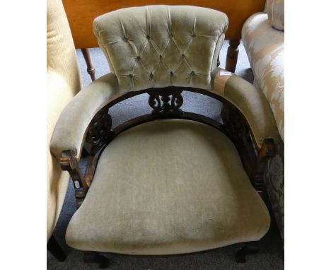 An Edwardian library chair, button back, upholstered in green fabric