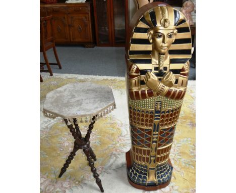 A CD cabinet in the shape of an Egyptian Pharaohs sarcophagus, 121 cm high x 34 cm wide overall together with an octagonal to