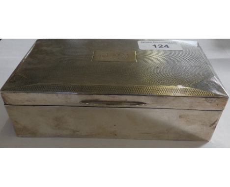 A silver cigarette box, Birmingham 1935 with engine turned decoration