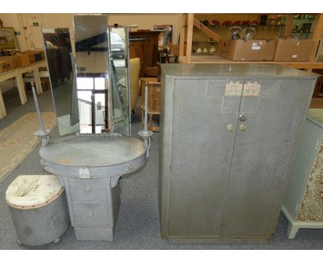 An Art Deco grey painted oak bedroom suite comprising of a triple mirrored dressing table with two light fittings to either s