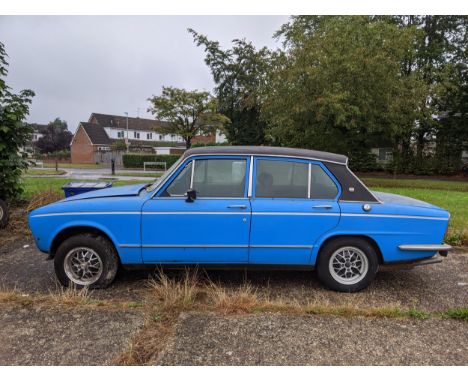 A Triumph Dolomite Sprint first registered in October 1980 1998cc petrol registration number 28KO in blue livery with a black
