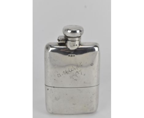 An early 20th century silver hip flask by Deakin &amp; Francis, Birmingham 1924, with a twist hinged cap, curved body and det